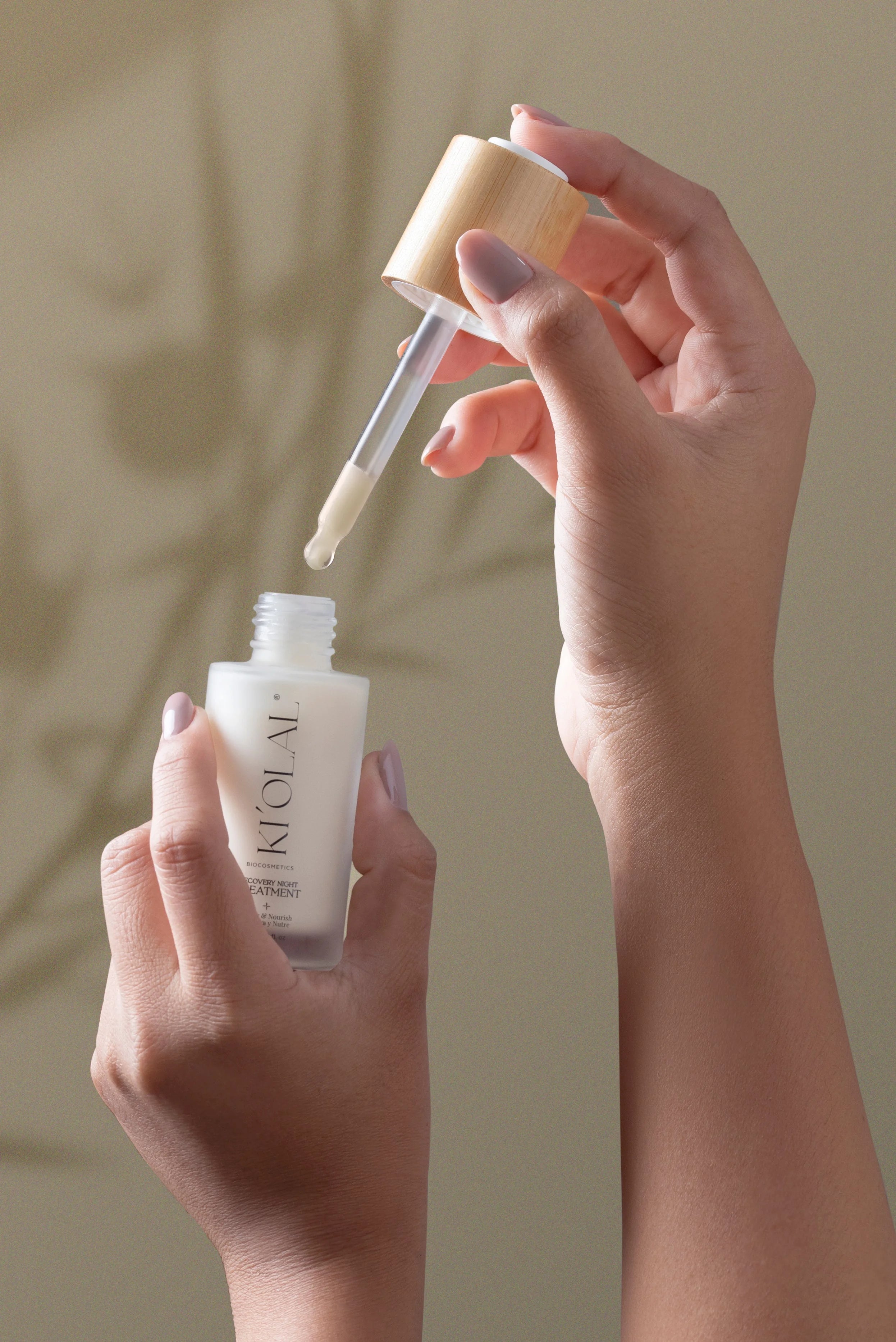 KI'OLAL skincare flat lay in morning light, emphasizing natural beauty