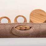 Top view of KI'OLAL skincare set in beige cactus leather case
